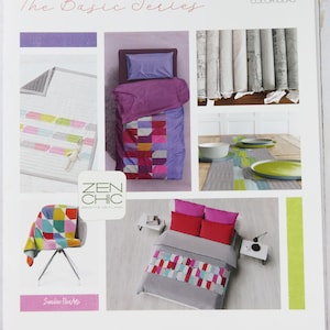 May include: A brochure for a quilting pattern called "Zen Chic: The Basic Series". The brochure features images of quilts in various colors and patterns, including a purple quilt, a red and white quilt, and a green and white quilt. The brochure also includes the text "Just Flip It" and "1 Block - 5 Patterns, Different Project Sizes, Color Ideas".