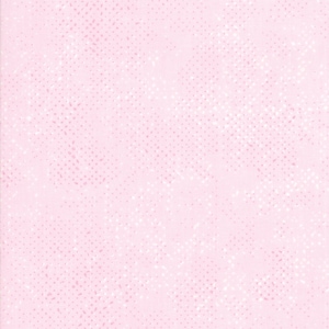 May include: A pale pink fabric with a white polka dot pattern. The dots are arranged in a diagonal pattern.