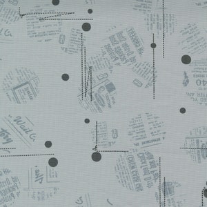 May include: A light blue background with a pattern of black circles and black lines. The background is covered with a faded newspaper print.
