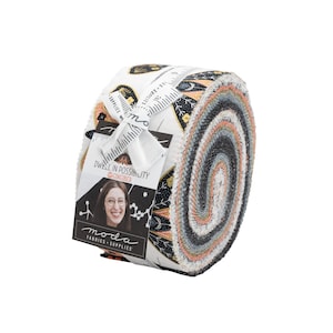 May include: A fabric roll with a white background and a colourful pattern of butterflies and flowers. The roll is labelled "Dwell in Possibility" and "@gingiber".