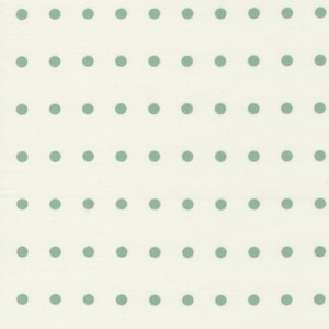 May include: A white fabric with a repeating pattern of sage green polka dots.