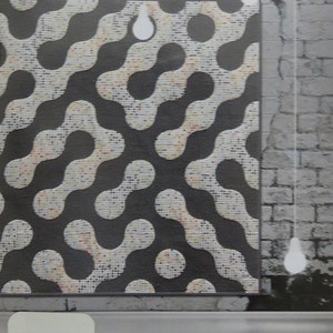 May include: A black and white quilt with a maze pattern. The quilt is made of small squares of fabric. The quilt is hanging on a white brick wall. The text "Zen Chic" and "A-Maze Me!" is printed on the bottom of the image.