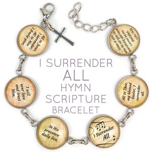 May include: A silver bracelet with charms featuring Christian hymns and scripture verses. The charms are round and have a vintage look. The bracelet has a clasp closure.