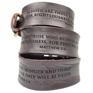 May include: Brown leather bracelet with the words "Blessed are those who hunger and thirst for righteousness, for they will be filled. Matthew 5:6" engraved on it.