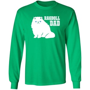 May include: Green long-sleeved t-shirt with a white ragdoll cat silhouette and the text "Ragdoll Dad" in white letters.