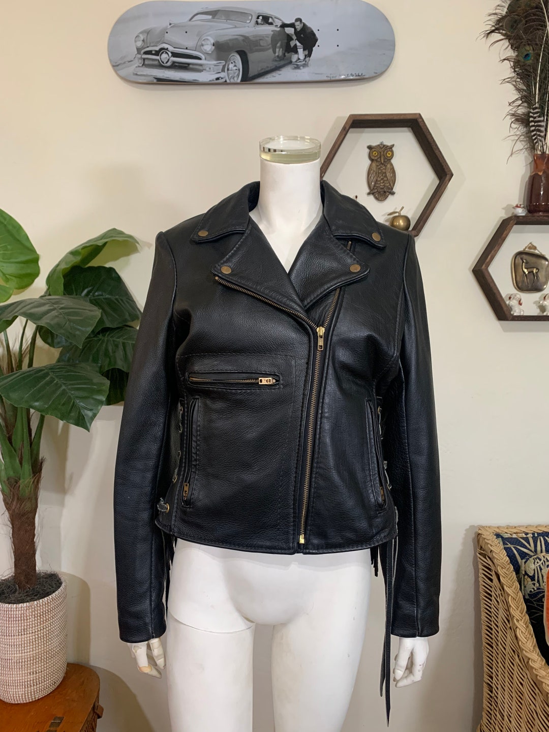 vintage-black-leather-fringed-womens-motorcycle-jacket-brass-details