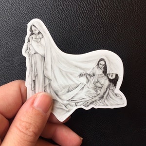 Jesus and Mary “Swaddle and Shroud” Catholic vinyl sticker