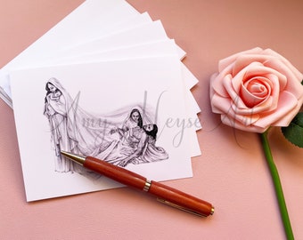May include: A stack of white blank cards with a pencil sketch of a religious scene, featuring figures in flowing robes. A wooden pen with gold accents rests on the cards. A pink rose is in the background.