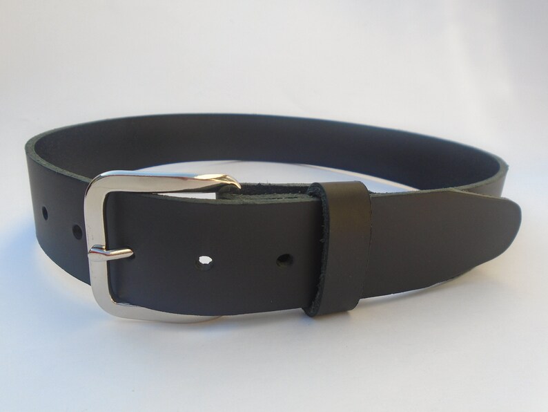 May include: A black leather belt with a silver buckle.