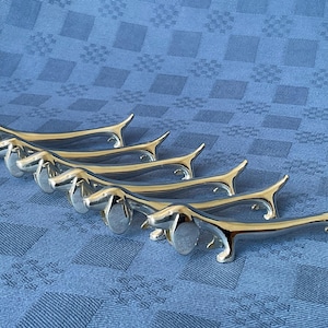 6 silver knife holders in thé shape of dachshunds, 1970’s