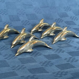 6 silver plated metal knife holders , dolphin shaped , 1970&#39;s