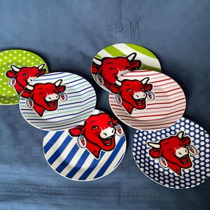 6 Advertising plates for a French cheese, La Vache qui Rit ( the  laughing cow )