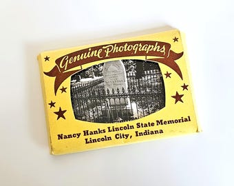 May include: A vintage yellow and brown souvenir photograph of the Nancy Hanks Lincoln State Memorial in Lincoln City, Indiana. The photograph is in a rectangular box with the words "Genuine Photographs" and star graphics.