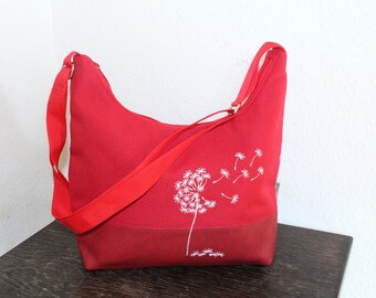 Red shoulder bag with embroidered dandelion