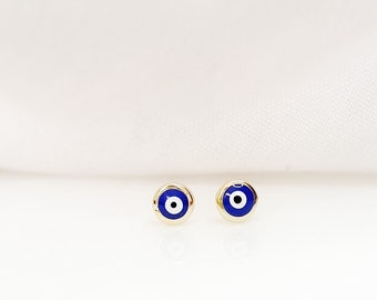 Puces d'oreilles bleu foncé Evil Eye. Argent sterling 925 plaqué or. Fermoirs ronds Evil Eye.Papillon