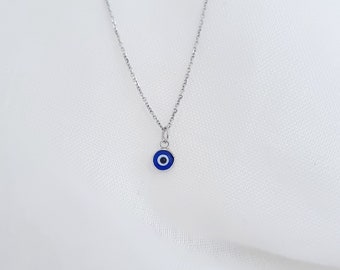 Colgante de dos caras del mal de ojo griego azul oscuro diminuto de plata. Plata de Ley 925 Mal de Ojo Azul. Amuleto de Buena Suerte y Protección. Sin cadena.