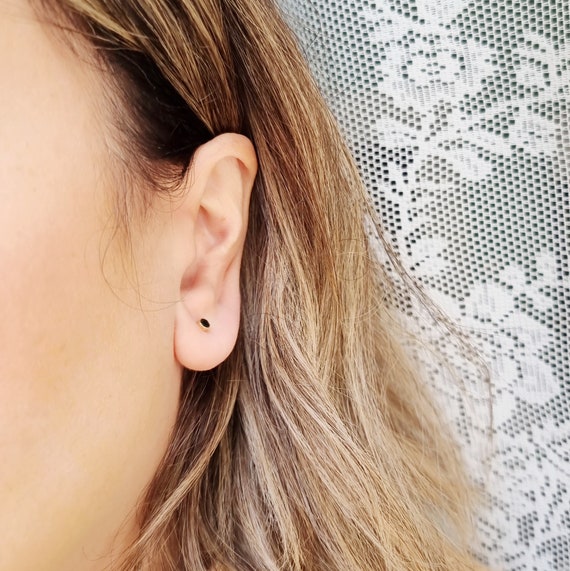 14K Tiny Solitaire Black Cubic Zirconia Stud Earrings. 14K Yellow