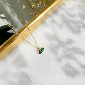 14K Tiny Greek Evil Eye Necklace Pendant. 14K Yellow Solid Gold. White and Green Enamel. Good Luck and Protection Charm