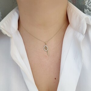 Pendentif raquette de tennis en or 14 carats avec zircone cubique