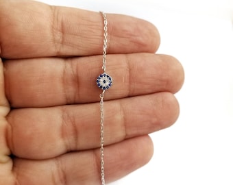 Pulsera griega de plata de ley con ojo turco: Joyería de buena suerte y protección con circonitas azules y blancas.