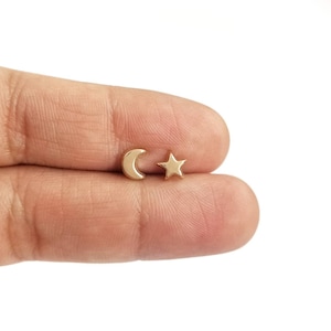 9K Half Moon and Star Stud Earrings.9K Yellow Solid Gold. 9K Yellow Solid Gold Butterfly Clasps in silicone.