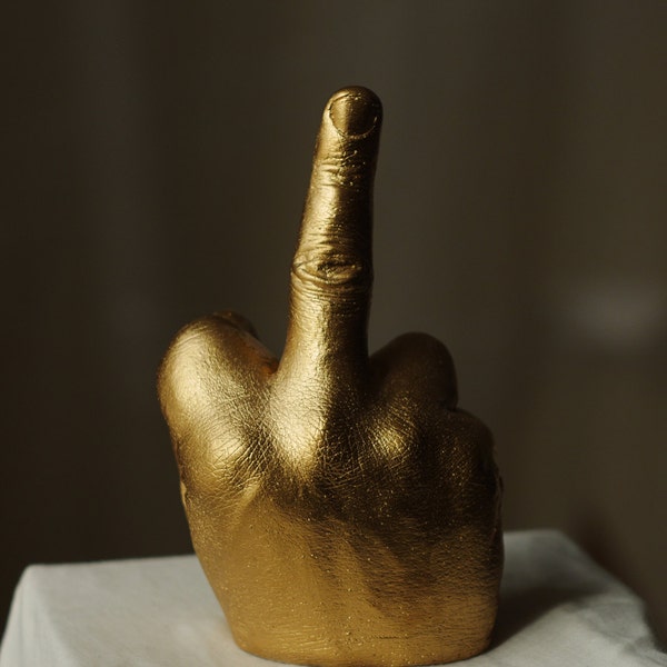 PLASTER HAND giving the finger (gold finish), actual cast of a hand making a rude gesture painted gold