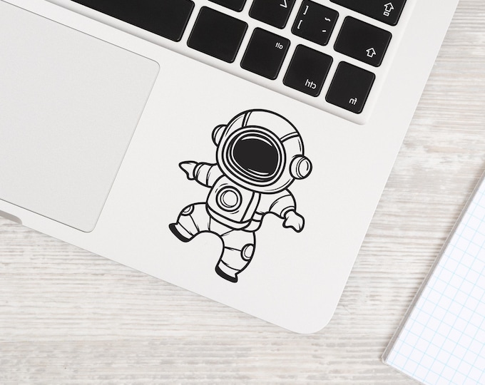 Astronaut Laptop Decal: Black Vinyl Floating Space Explorer Sticker