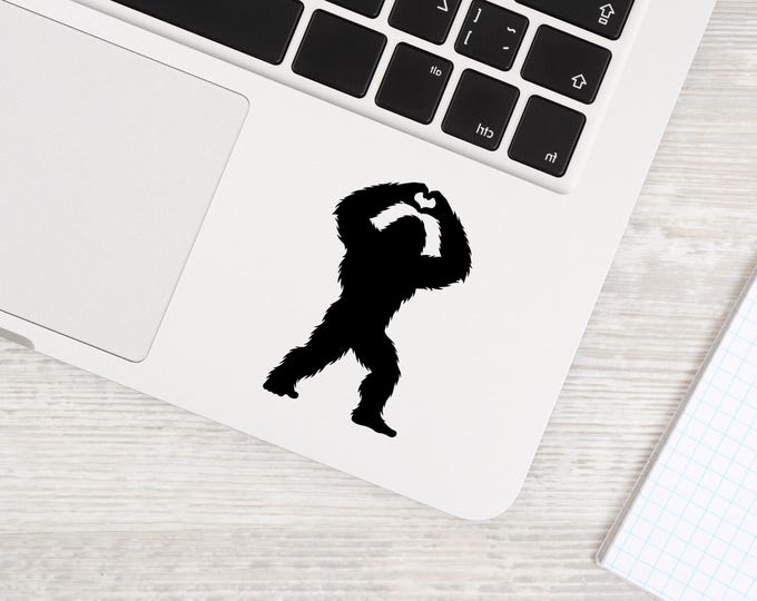 Bigfoot Laptop Decal: Black Sasquatch Heart Hands Sticker