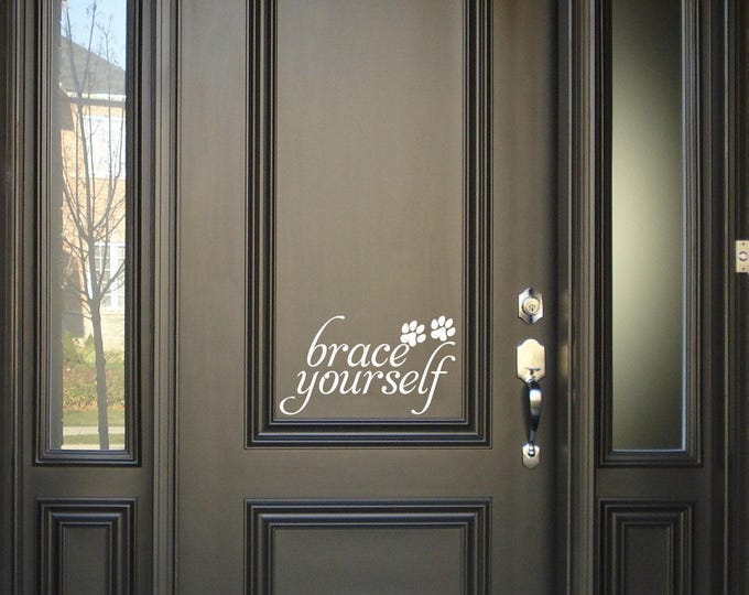 Brace Yourself Door Decal: Paw Print Accent with Script Lettering
