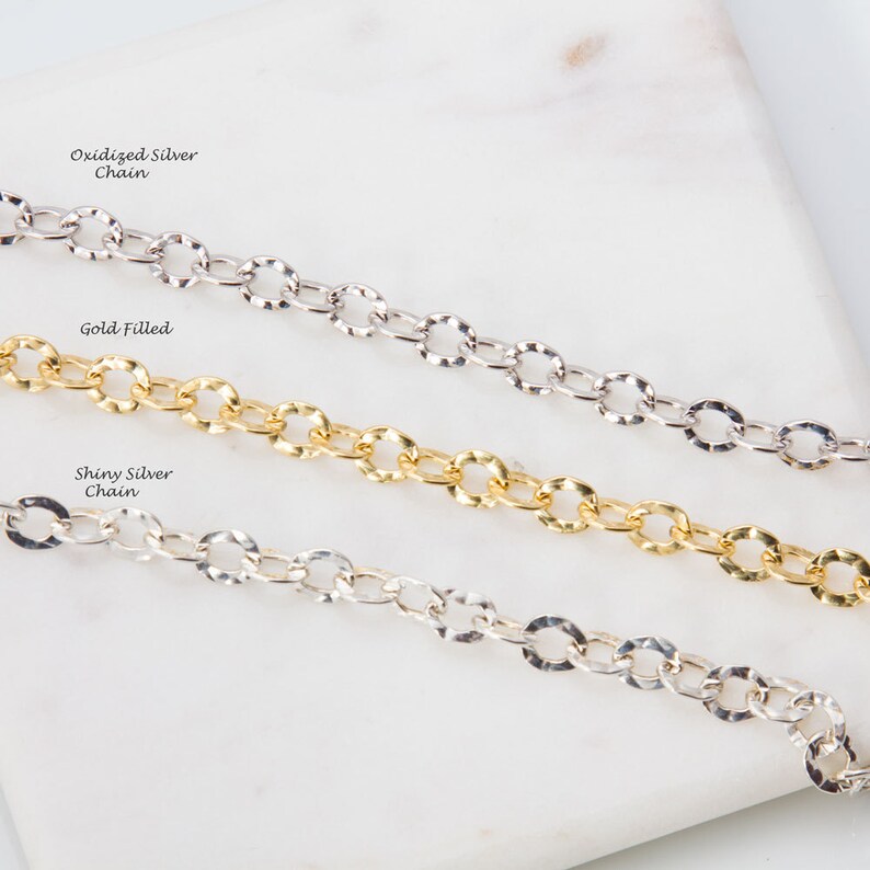 May include: Three silver chains on a white surface. The top chain is labeled "Oxidized Silver Chain", the middle chain is labeled "Gold Filled", and the bottom chain is labeled "Shiny Silver Chain".