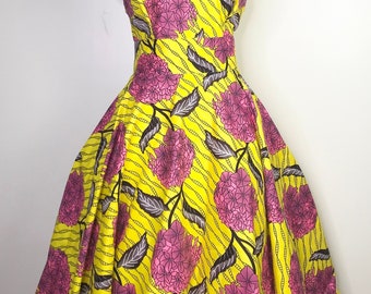 Sophisticated Modest Yellow and Pink Floral Circle Skirt Dress for a Classy Woman