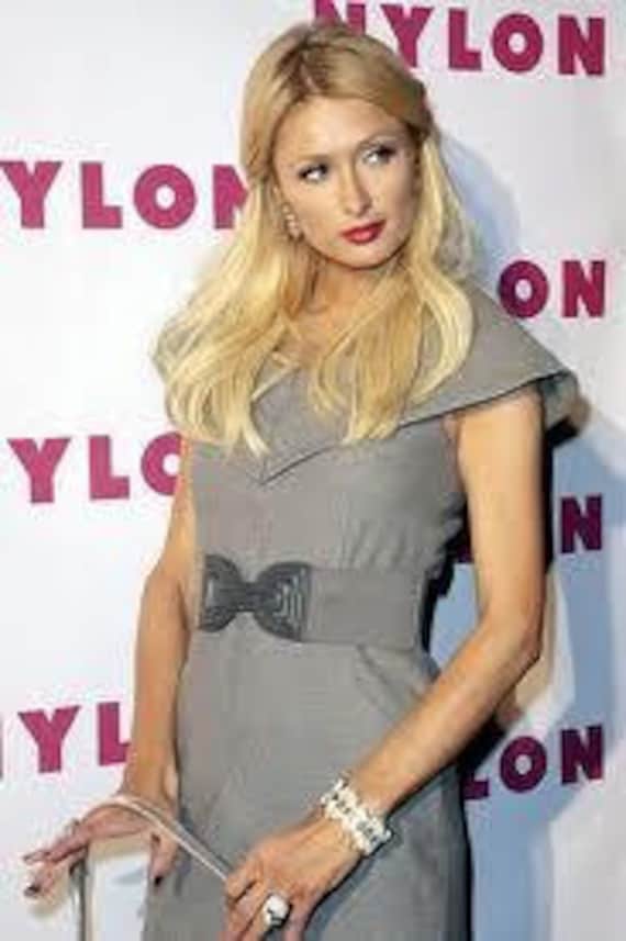 Paris hilton skull ring deals