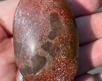 Arusha Sunstone Big Palmstone with Rainbow Confetti Flash on all sides and Pink Silver Flash,  Sunstone with smoky Quartz