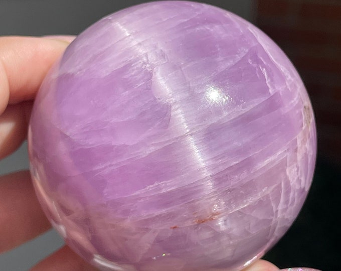 Featured listing image: Kunzite Big Statement Sphere with a Cats Eye Flash and Rainbow AAA Grade Collector Edition Crystals