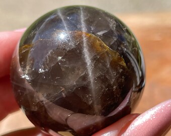 Star Black Rose Quartz Sphere with Golden Healer - Madagascar Rose Quartz