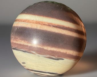 Natural banded feldspar & muscovite sphere with striking cream and chocolate layers — unique polished metamorphic stone