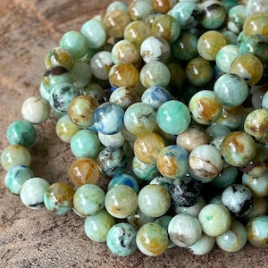 Quantum Quattro Silica Bracelet , Malachite, Dioptase, Chrysocolla, Shattuckite in a Smoky Quartz matrix, Chrysocolla in Quartz beads