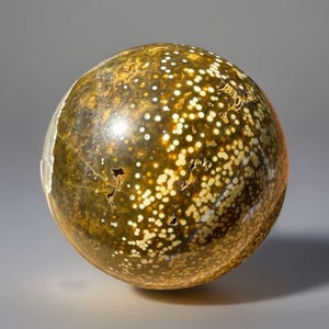 Orbicular Ocean Jasper Sphere (74mm): Madagascar Vein with Quartz Window