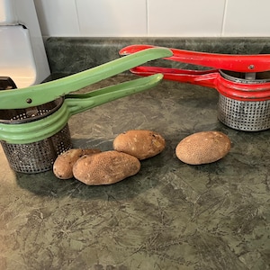 Summer Sale:  Vintage Pair of 1950s Steel Potato Masher/Tomato juicers One Red and One Green