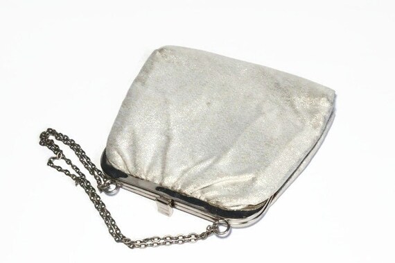 silver evening bag with shoulder strap