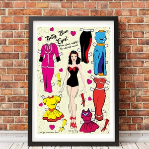 May include: A vintage-style paper doll set featuring a woman with blue eyes and red hair. The set includes a variety of outfits in pink, red, yellow, blue, and black. The text on the image reads "Betty Blue Eyes! Pure glam outfits! The cutest doll around!"