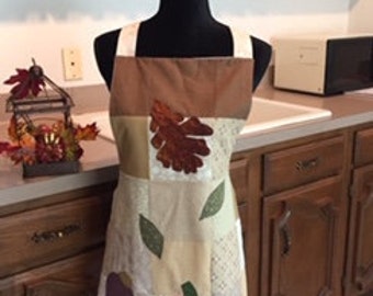 Fall/Autumn/Thanksgiving womens full apron, size medium, appliqued with apples, squash, pumpkin, and leaves.    leaves, reversible