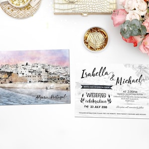 May include: Wedding invitation with a watercolor illustration of a coastal town in Algarve, Portugal. The invitation is for Isabella and Michael's wedding celebration on July 23, 2018, at Quinta Jacintina Hotel in Almancil, Portugal.