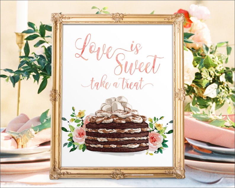 May include: A printable sign with a watercolor illustration of a chocolate cake with pink and yellow flowers. The text on the sign reads "Love is Sweet take a treat".