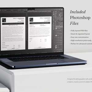 May include: A dark grey laptop displaying Adobe Photoshop software with two open document windows showing white business forms with black text and the logo EA for Emily Anderson Photography. The screen shows layers and toolbars.