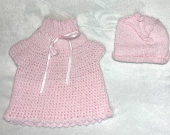 Hand-knit dress and matching bonnet