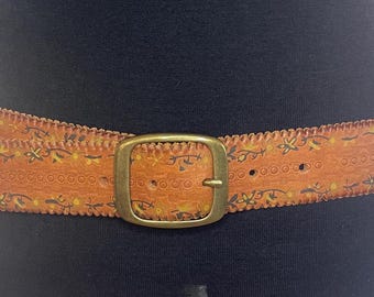 Vintage genuine leather belt with painted flowers embossed with scallop edges.