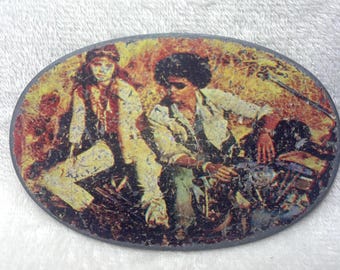 Vintage oval belt buckle with 70 era fashion distress picture
