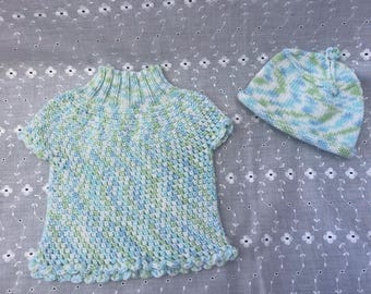 Newborn knit matching set with dress and beanie.