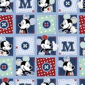 May include: A repeating pattern featuring Mickey Mouse in various poses, set within patchwork squares. The squares alternate between solid navy, red polka dots, and light blue gingham, with decorative buttons and the letter "M".
